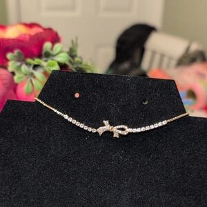 New Elegant Yellow Gold Bow Bracelet with Cubic Zirconias